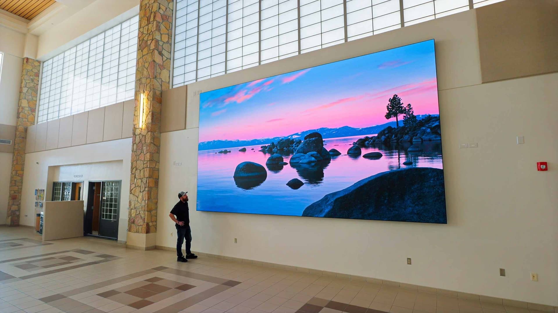 Lunar Walls video wall in a bright commercial space with vivid sunset imagery
